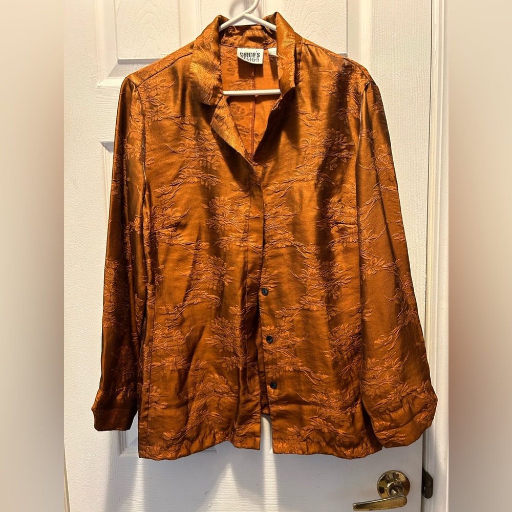 Woman’s button‎ up dress shirt